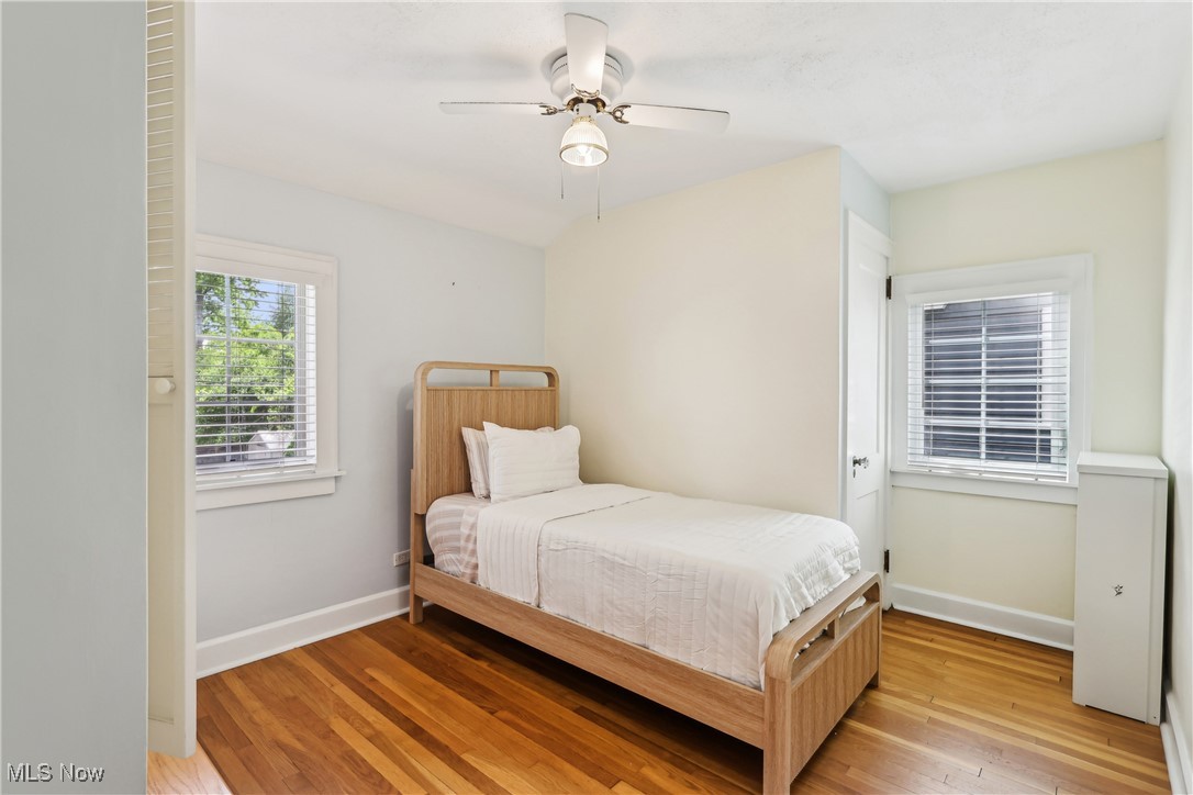 3295 Braemar Road Cleveland, OH 44120 - Photo 24 of 43 Bedroom with light wood flooring, baseboards, and ceiling fan.