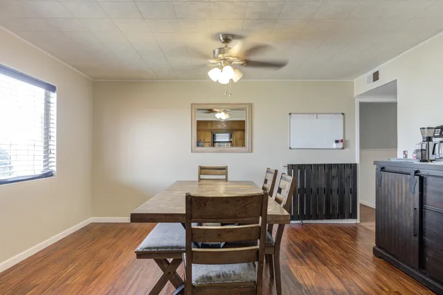 a workspace with wooden floor