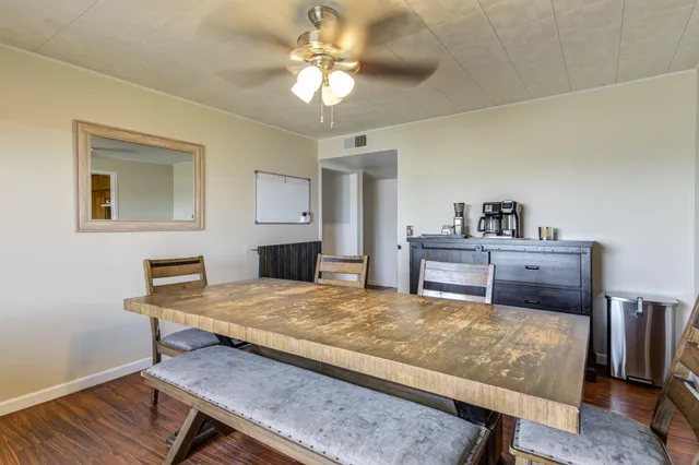 a bed room with a bed and a chandelier