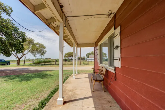 a building outdoor space with seating space and garden