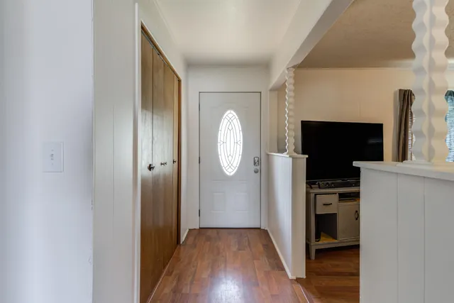 a view of a livingroom with wooden floor