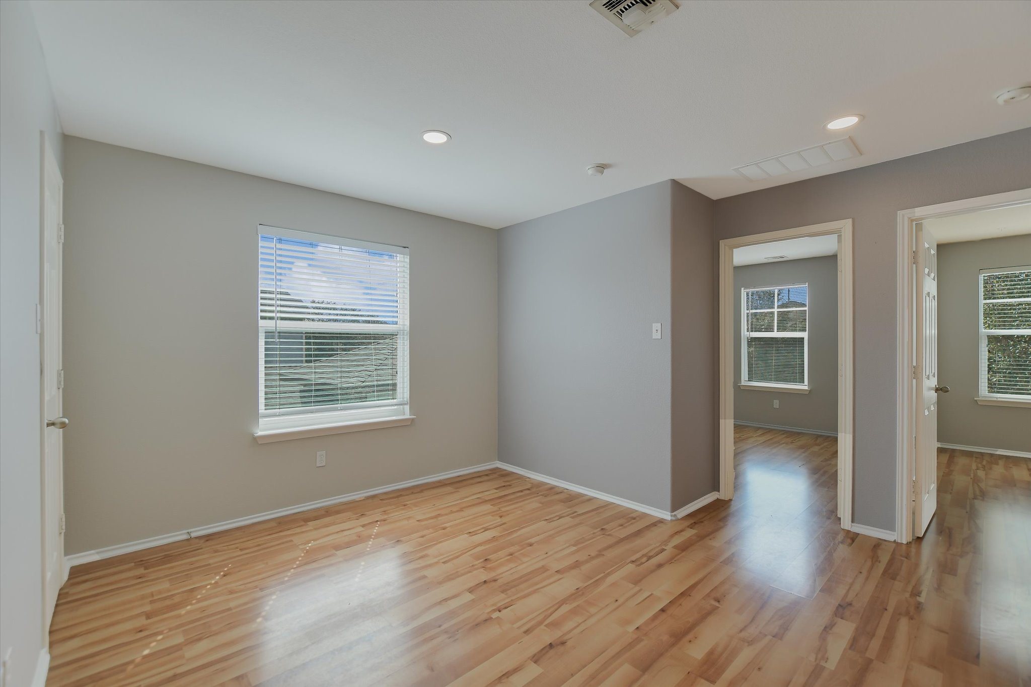 1420 Huckleberry Lane Austin, TX 78748 - Photo 13 of 21 Game room with healthy amount of natural light, light wood-type flooring, and recessed lighting