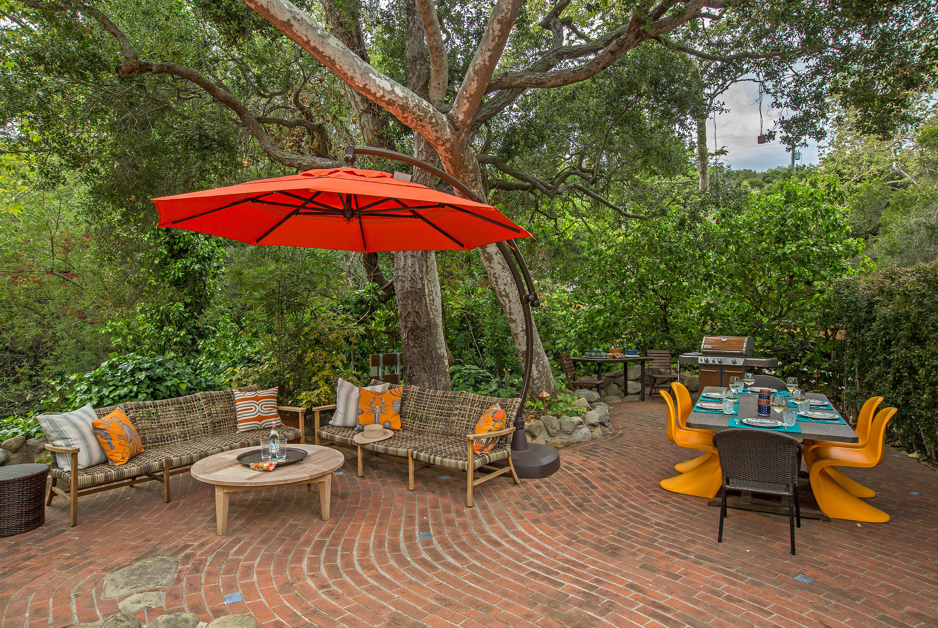999 Andante Road Santa Barbara, CA 93105 - Photo 4 of 26 an outdoor sitting area with furniture and wooden deck