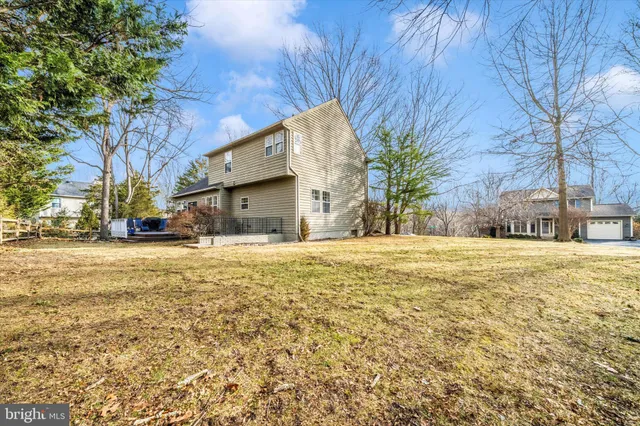 a house view with large trees