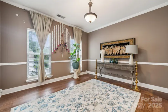 a living room with a couch and a flat screen tv