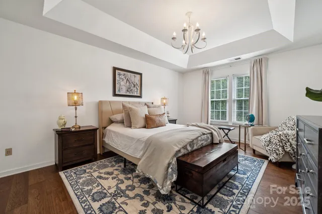 a bed room with a bed and a couch