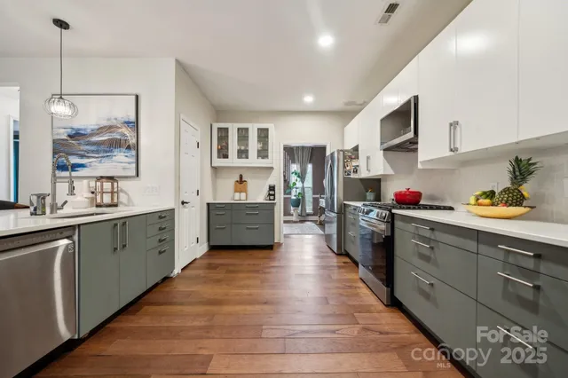 a kitchen with sink cabinets and counter