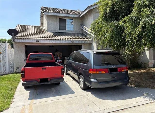 a car parked in front of a house