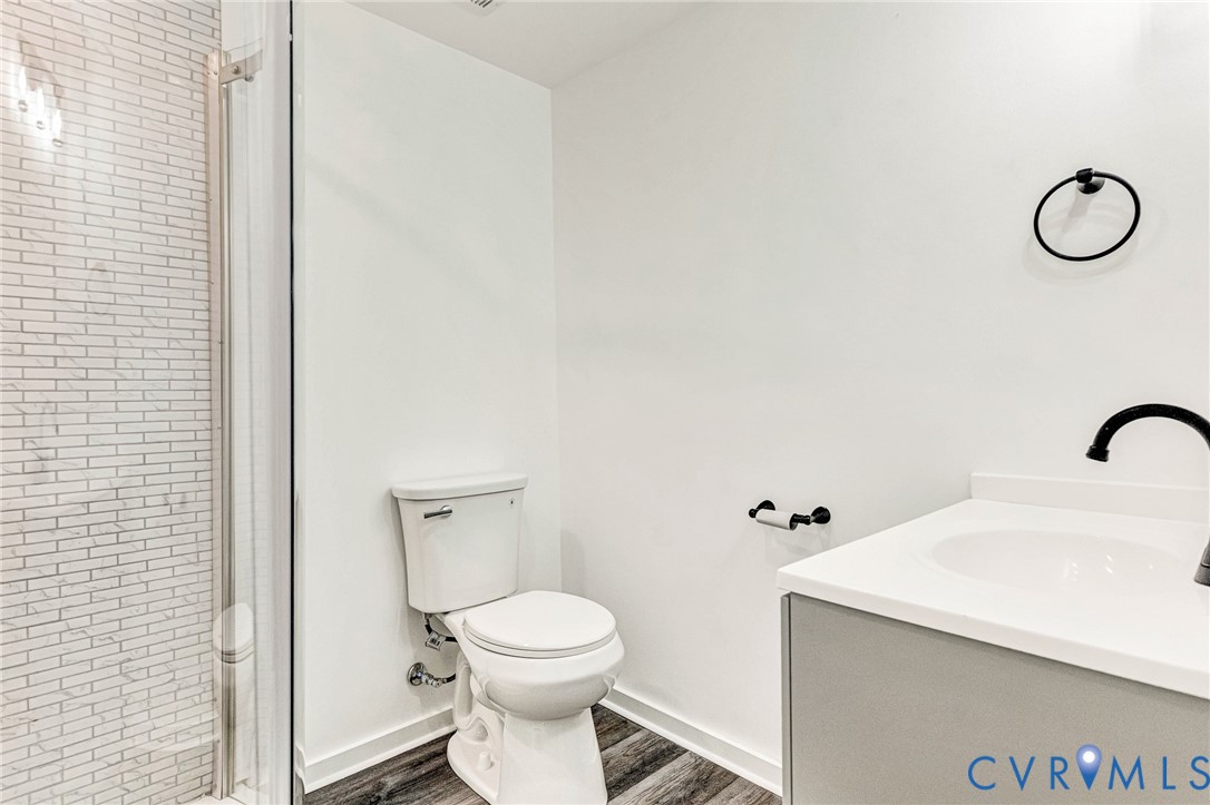 21139 Pendleton Road Bowling Green, VA 22427 - Photo 25 of 41 Shower with white brick-patterned tile, glass encl