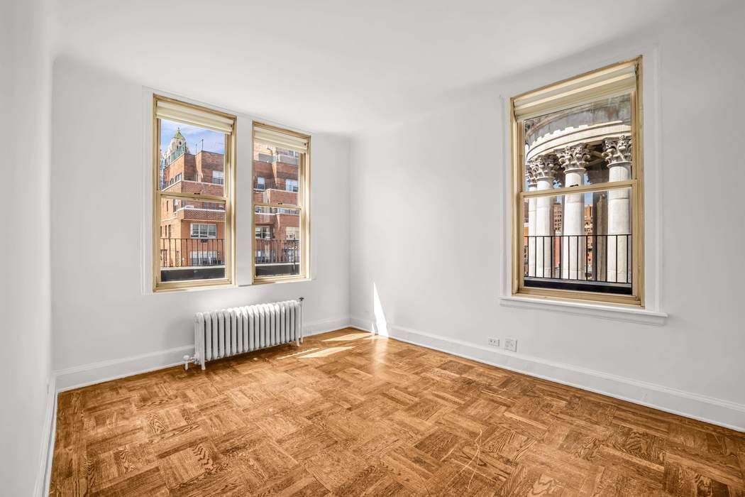 1065 Lexington Avenue, Unit PHA Manhattan, NY 10021 - Photo 3 of 12 a view of an empty room with a window
