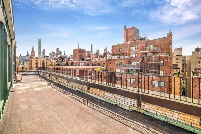 a view of a city with tall buildings