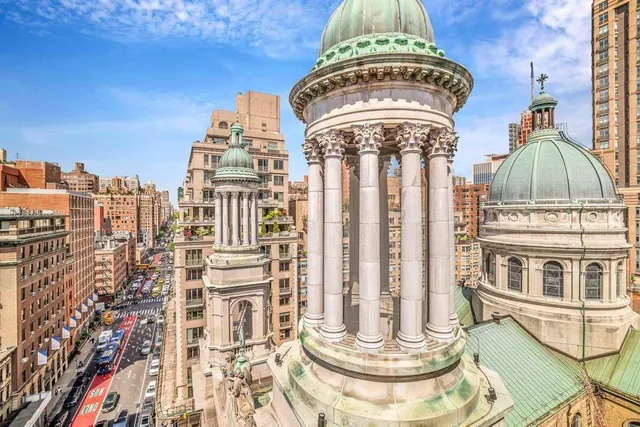 a view of a city with train tracks