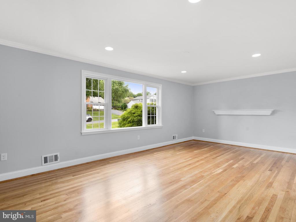 15121 Middlegate Road Silver Spring, MD 20905 - Photo 9 of 32 a view of an empty room with a window