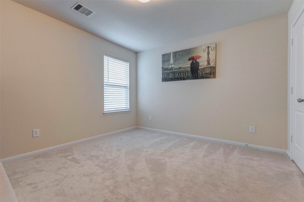 20623 Footstep Path Katy, TX 77449 - Photo 14 of 23 an empty room with windows