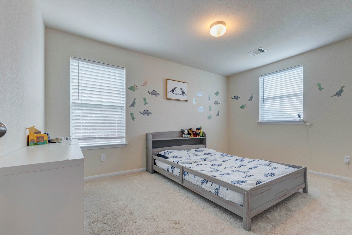 20623 Footstep Path Katy, TX 77449 - Photo 16 of 23 a bedroom with a bed and window