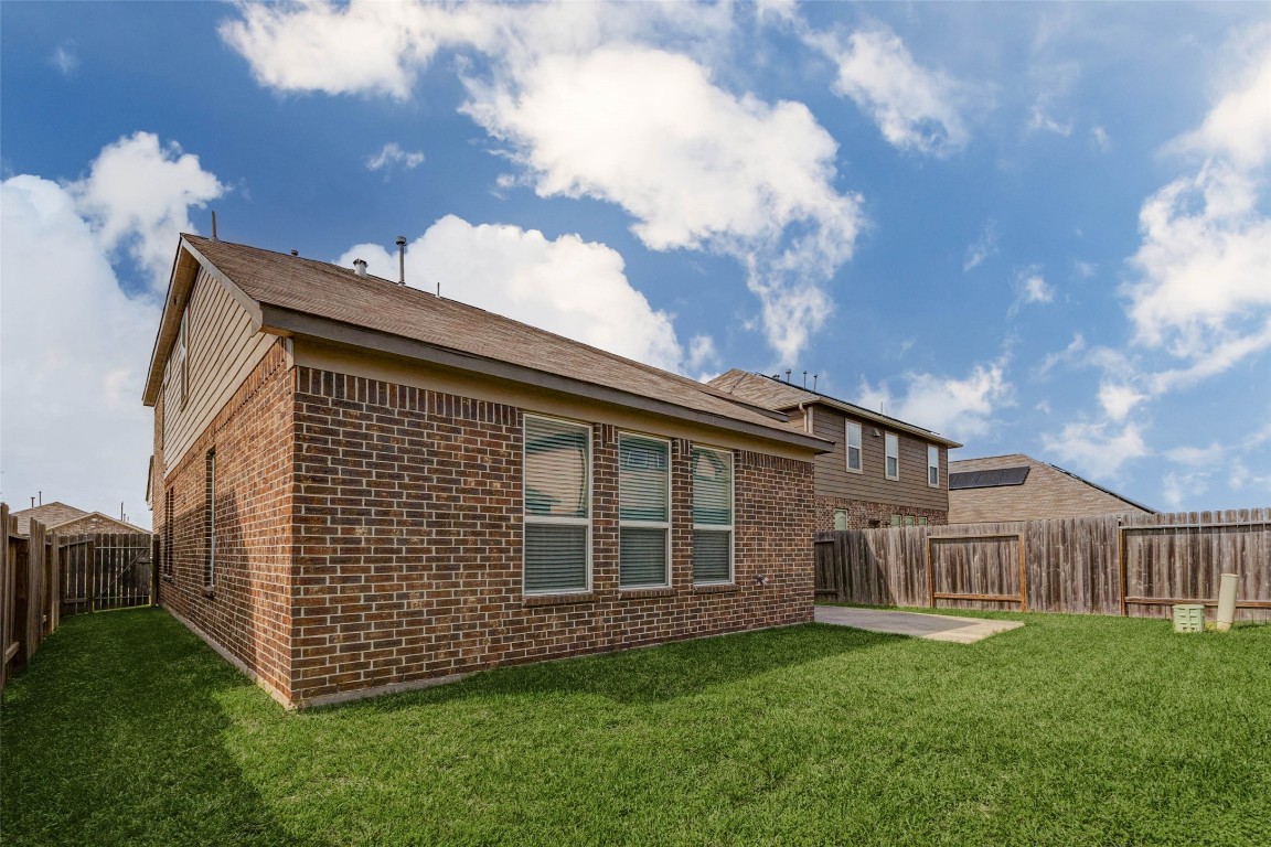 20623 Footstep Path Katy, TX 77449 - Photo 23 of 23 a front view of a house with a garden