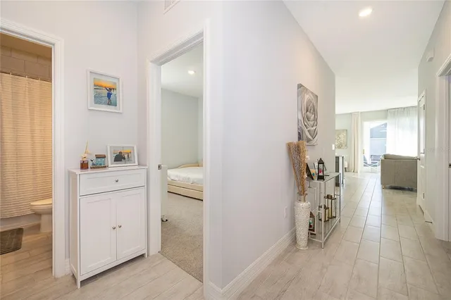 a kitchen with a sink a counter top space stainless steel appliances and cabinets
