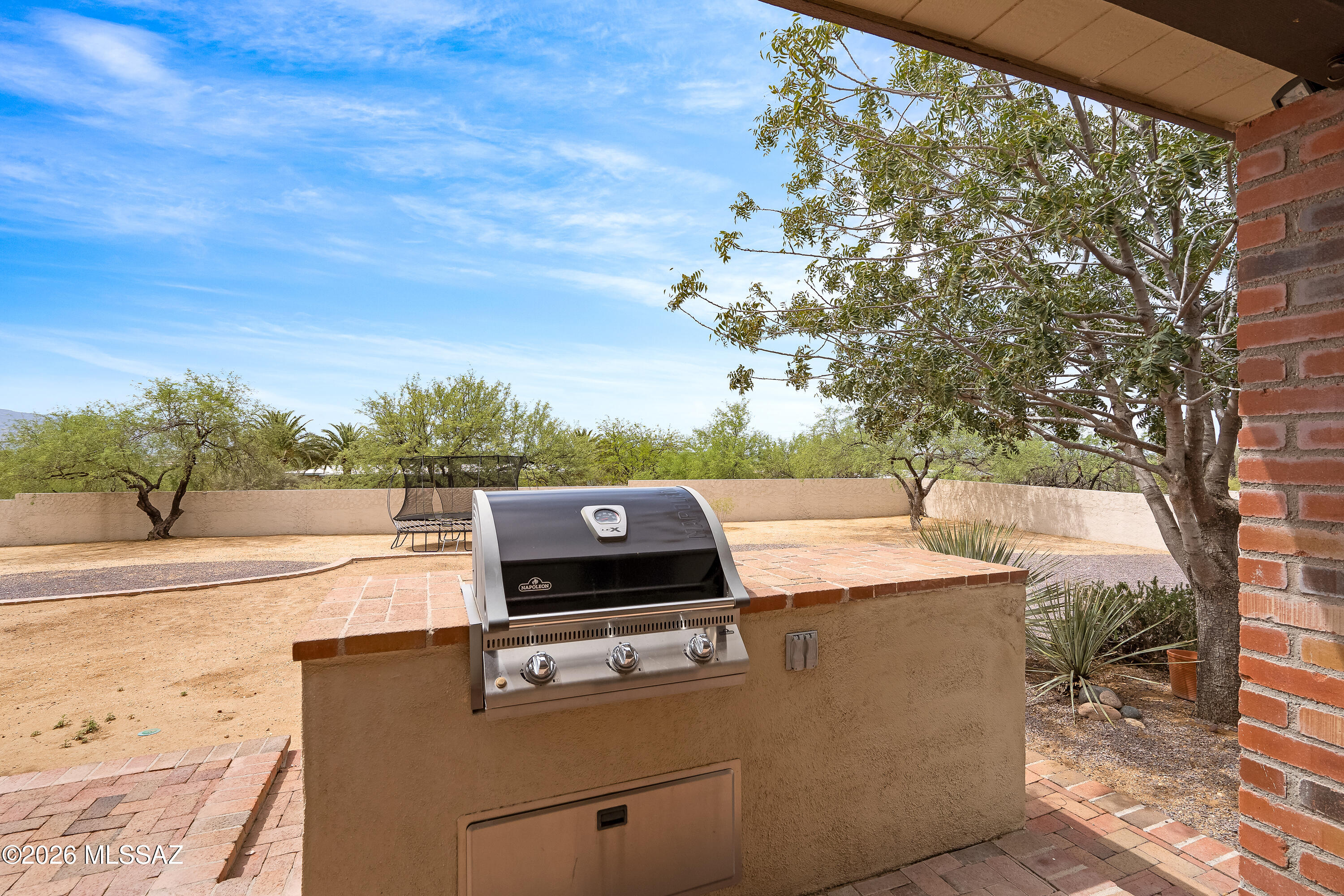 9420 East Ravine Trail Tucson, AZ 85749 - Photo 25 of 39 a view of a balcony with chairs