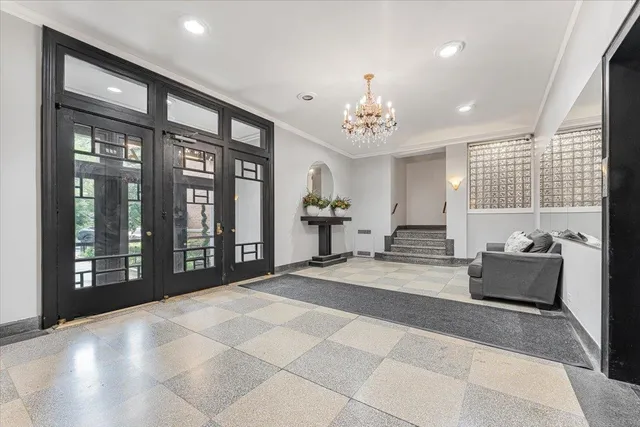 a view of a brick building with many windows