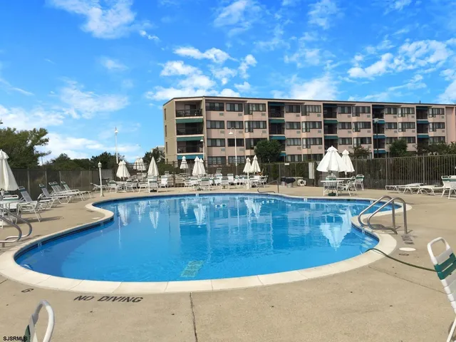 a front view of a building with street view