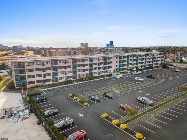 a cars parked in front of a building