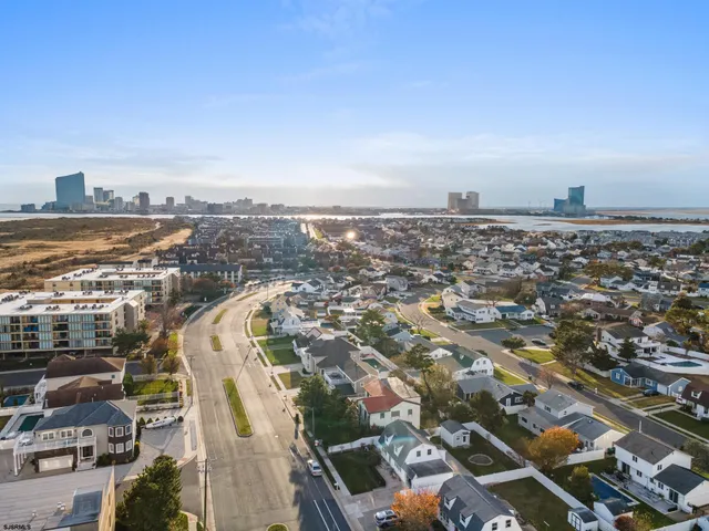 a view of a street with cars