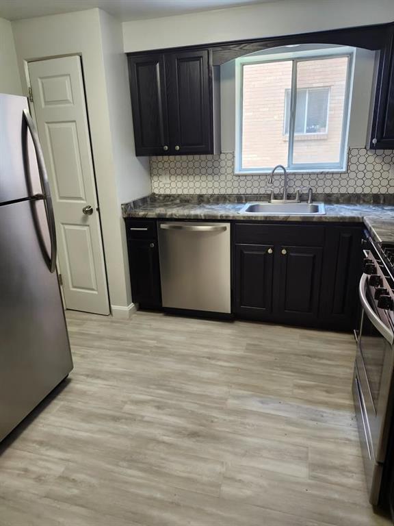 4 Fountain Street, Unit 3 Pittsburgh, PA 15205 - Photo 6 of 24 a kitchen with stainless steel appliances granite countertop a stove a sink and a granite counter tops