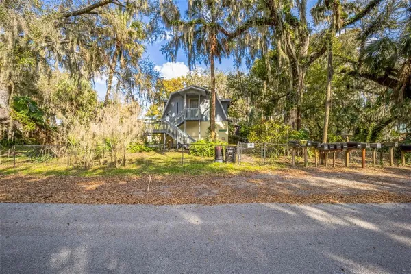 a view of road and trees