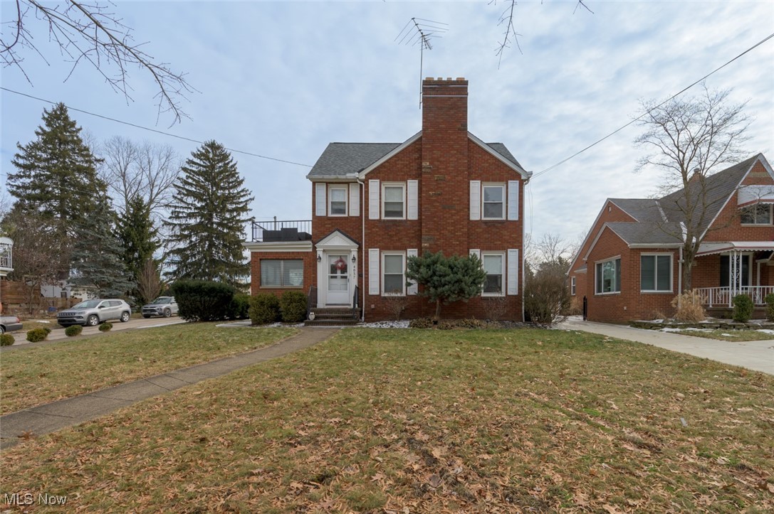 4037 Riveredge Road Cleveland, OH 44111 - Photo 1 of 30 View of front facade with a front lawn
