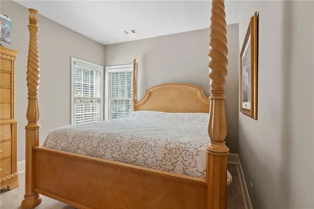a view of a bathroom with sink and mirror