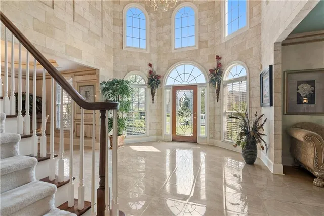 a view of front door and porch with furniture