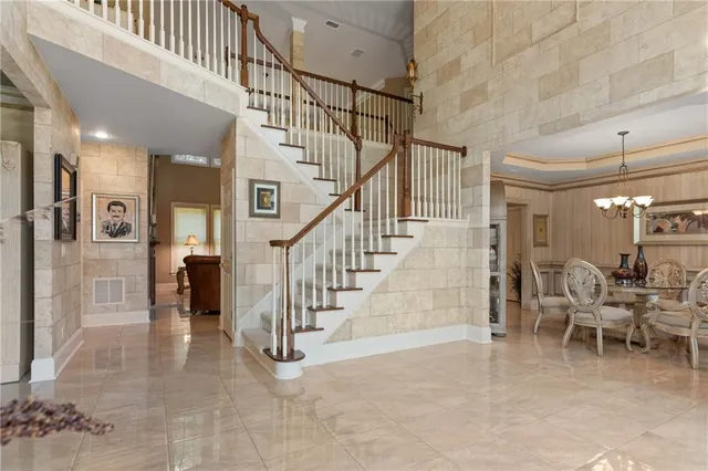 a view of a hallway with seating area