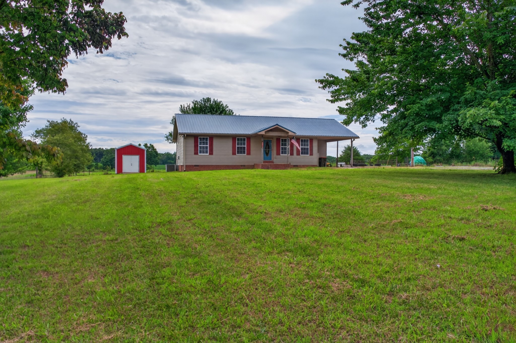 618 Lear Road Portland, TN 37148 - Photo 6 of 29 a view of a house with a big yard