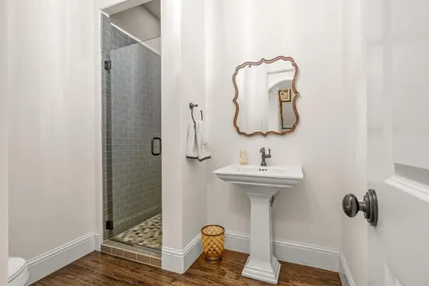 a bathroom with a sink and mirror