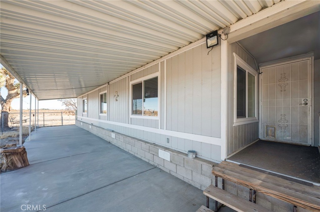 19665 Grey Mountain Road Adelanto, CA 92301 - Photo 25 of 30 a view of an outdoor space with windows