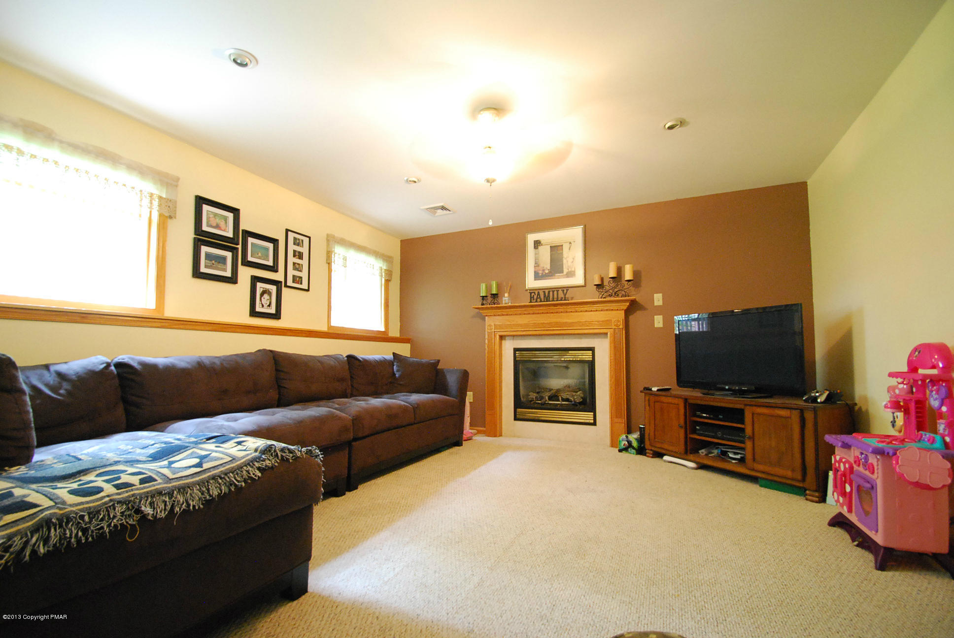 319 Edgemont Road Stroudsburg, PA 18360 - Photo 14 of 26 Family Room with Natural Gas Fireplace