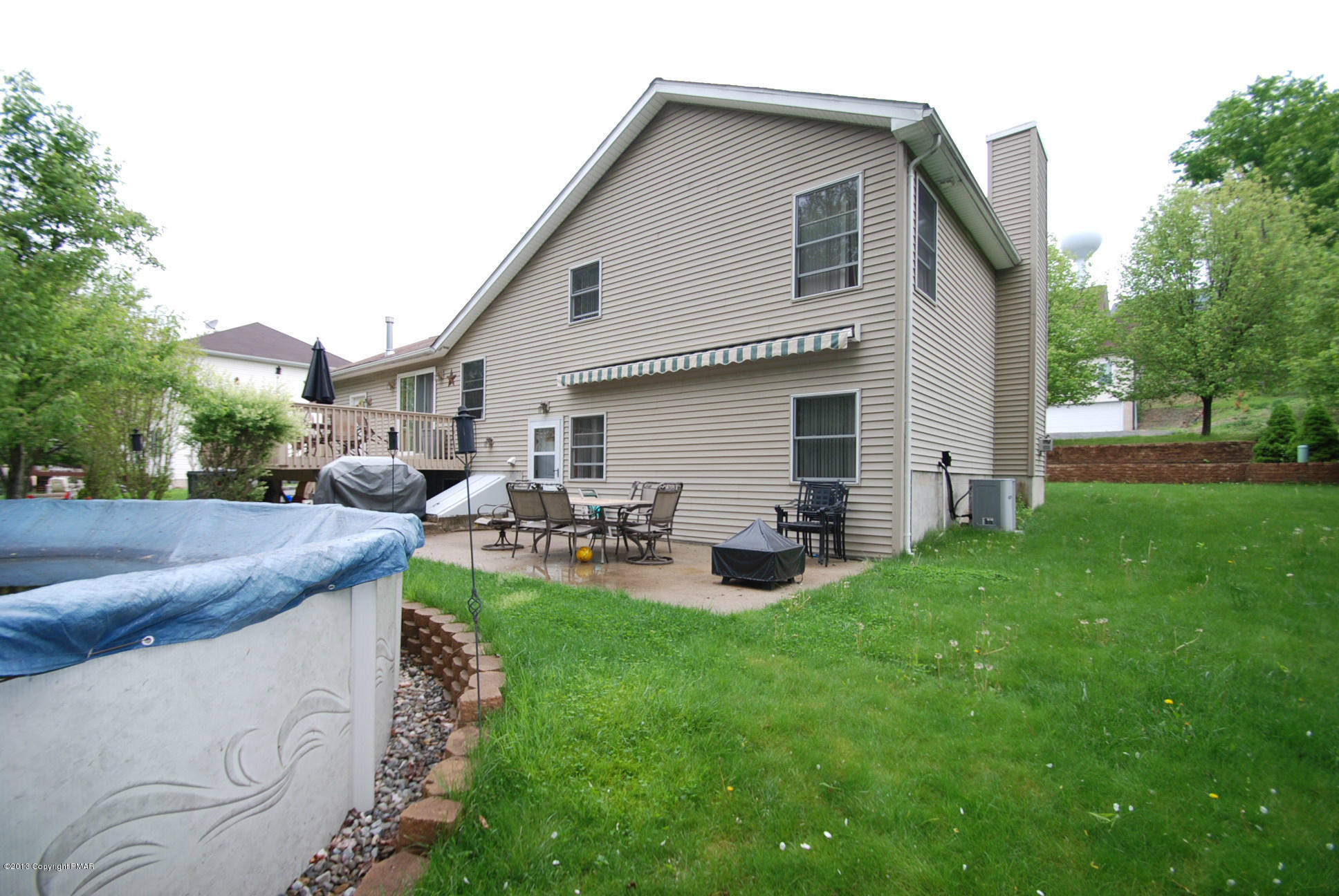 319 Edgemont Road Stroudsburg, PA 18360 - Photo 22 of 26 Patio with Retractable Awning