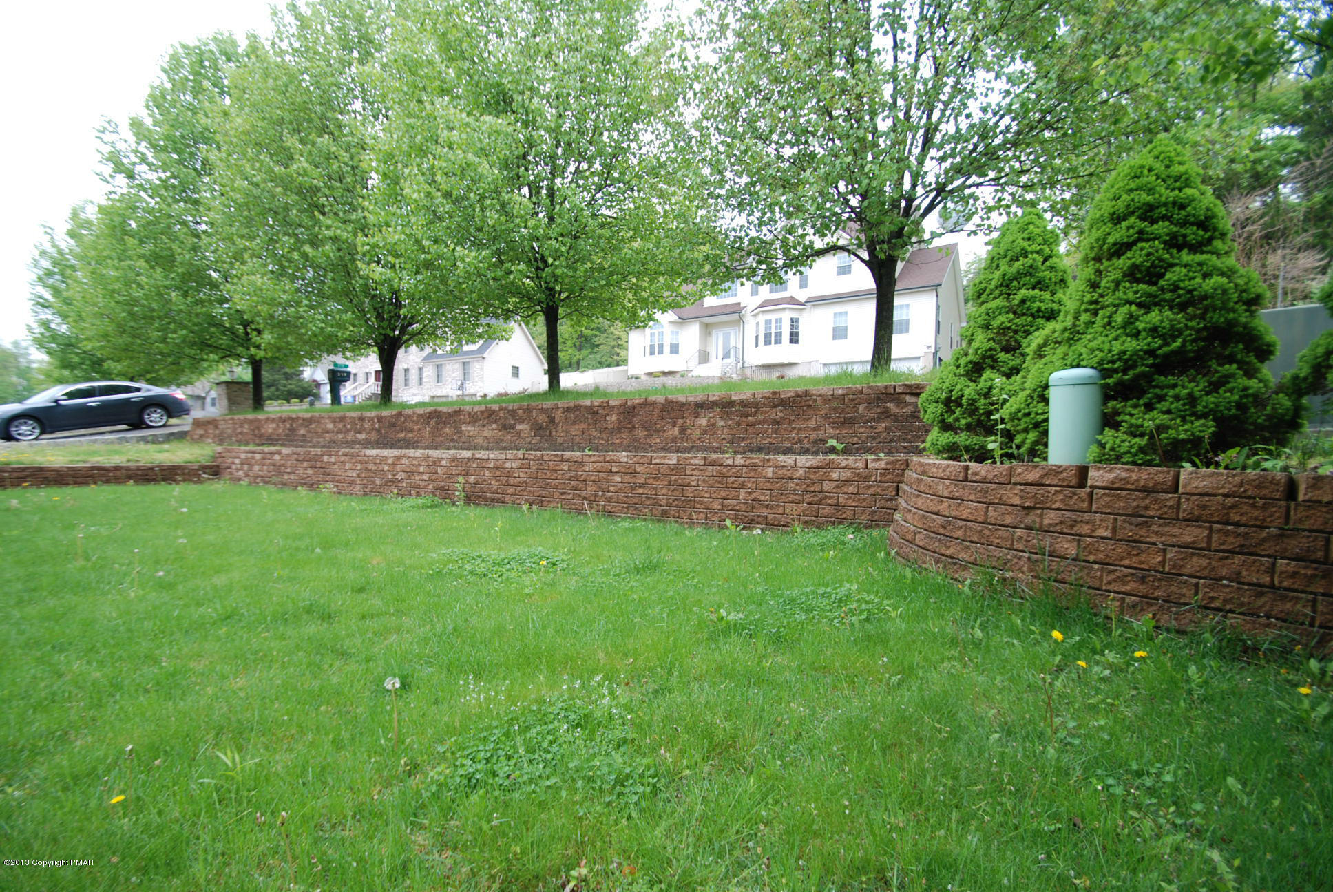 319 Edgemont Road Stroudsburg, PA 18360 - Photo 23 of 26 Flower Beds in Tiered Retaining Walls