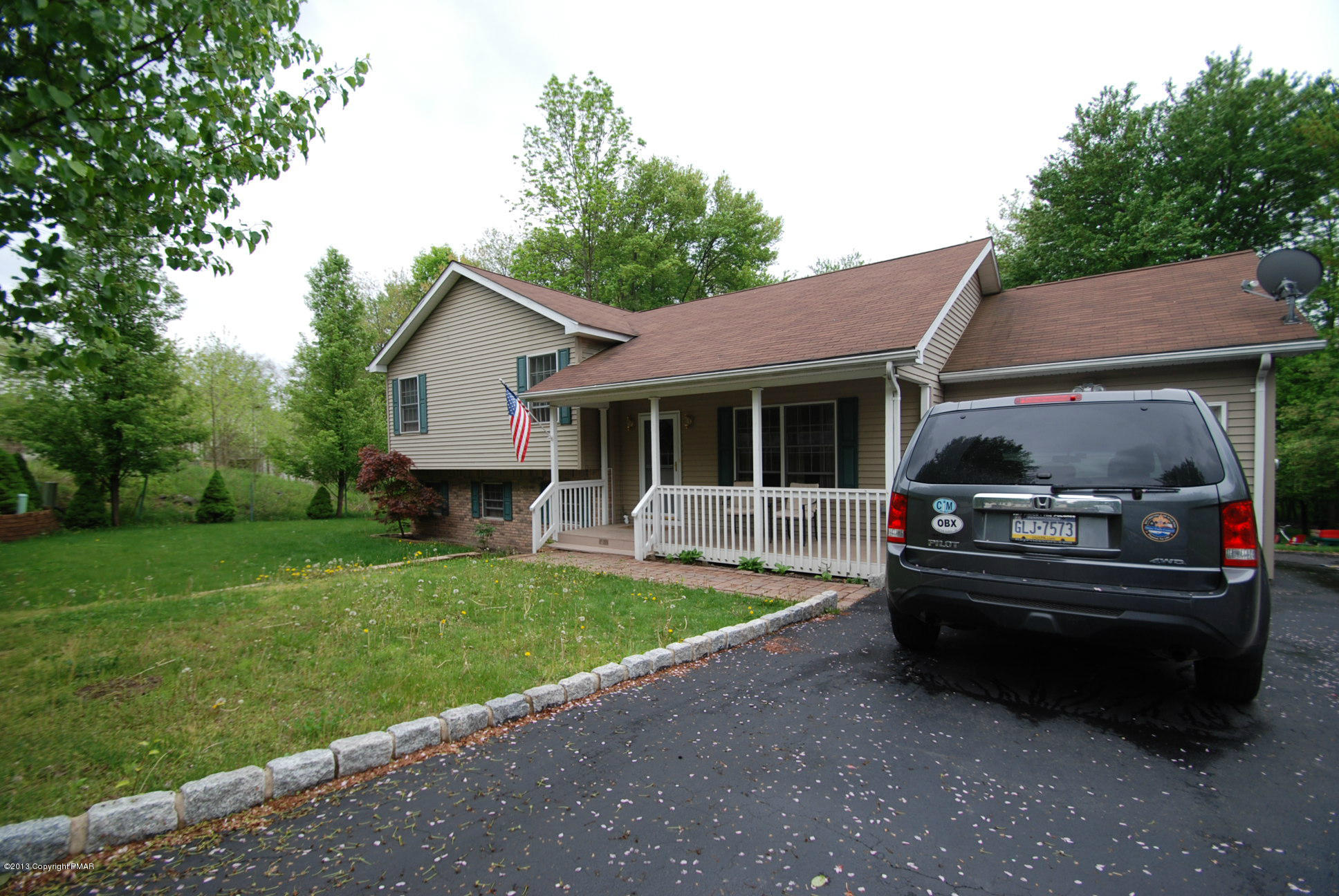319 Edgemont Road Stroudsburg, PA 18360 - Photo 25 of 26 Front Porch & Paved Driveway