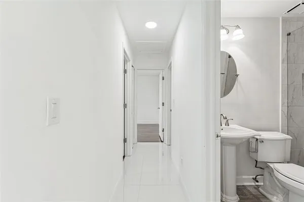a bathroom with a shower and a toilet