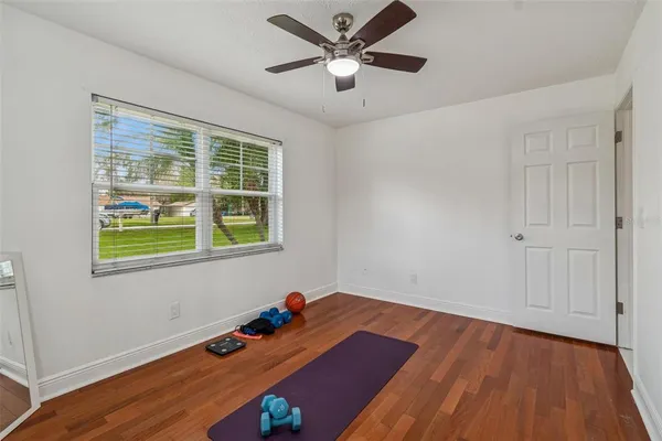 a view of a swimming pool with a patio