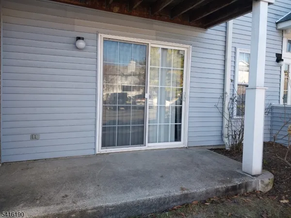 a view of outdoor space garage and window