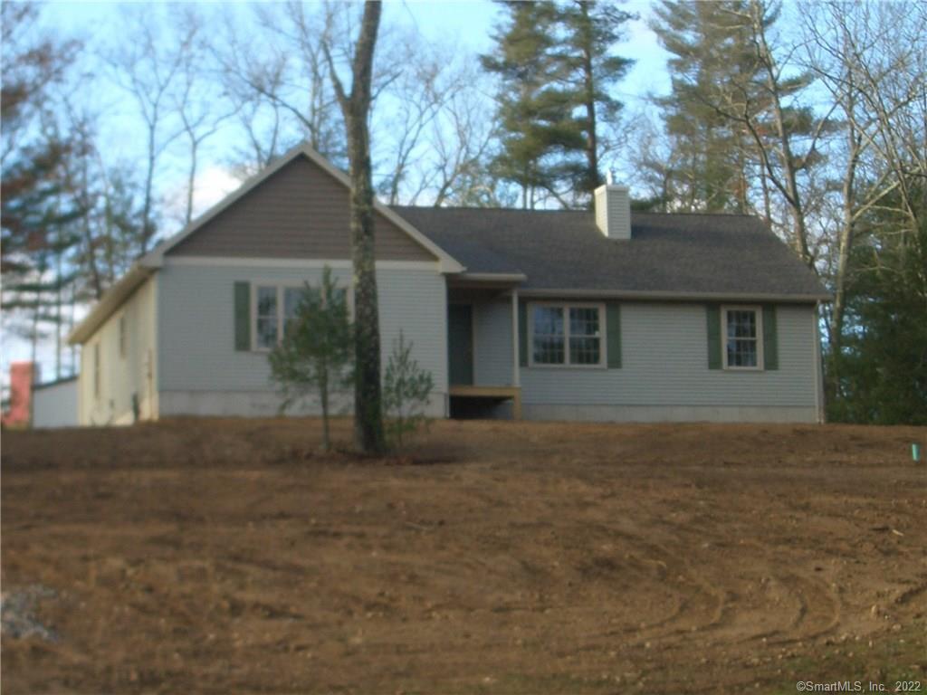 159 Tuckie Road Windham, CT 06256 - Photo 1 of 1 a house that has a tree in front of it