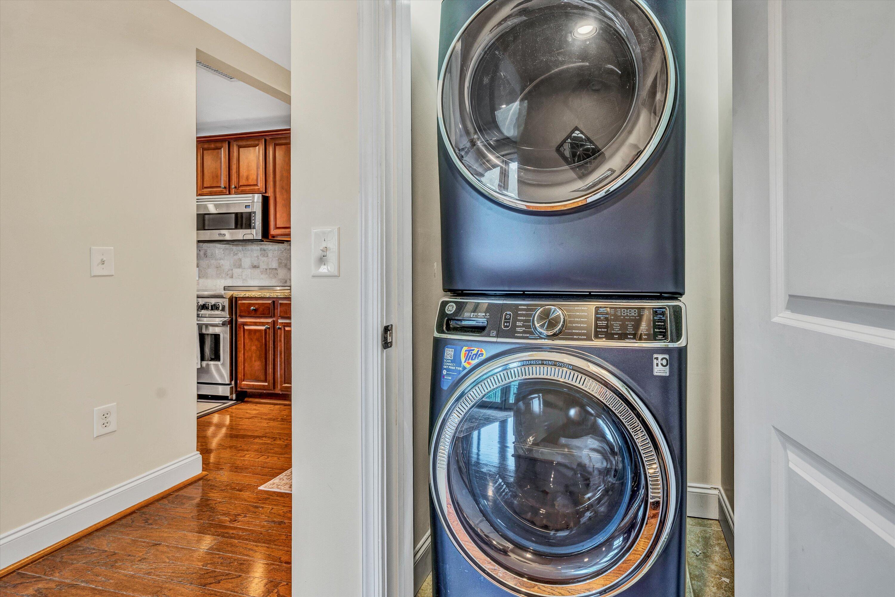 100 Bridgewater Pointe Place, Unit 401 Moneta, VA 24121 - Photo 16 of 39 a view of a hallway with washer and dryer