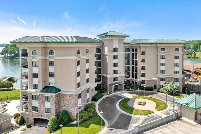 a front view of a house with a swimming pool