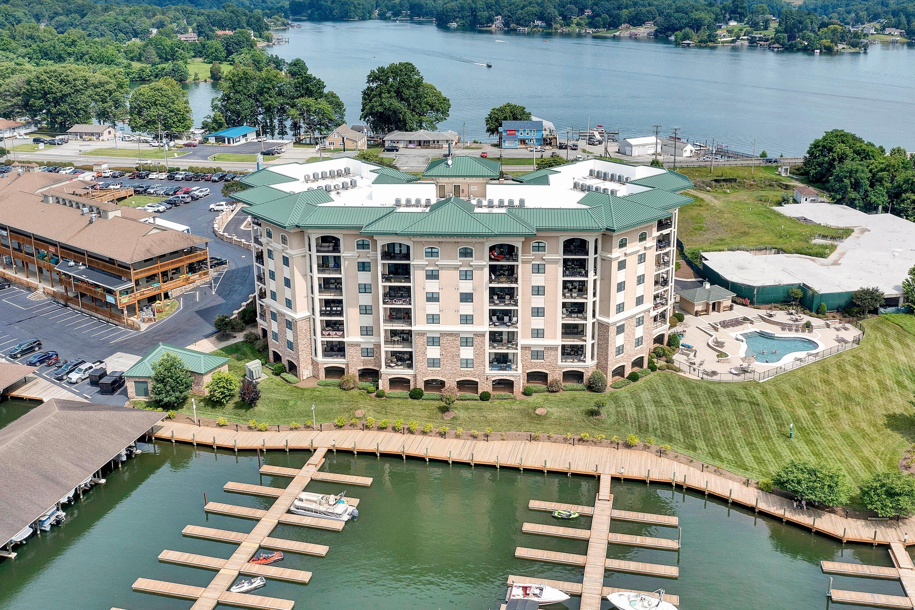 100 Bridgewater Pointe Place, Unit 401 Moneta, VA 24121 - Photo 34 of 39 an aerial view of a house with a lake view
