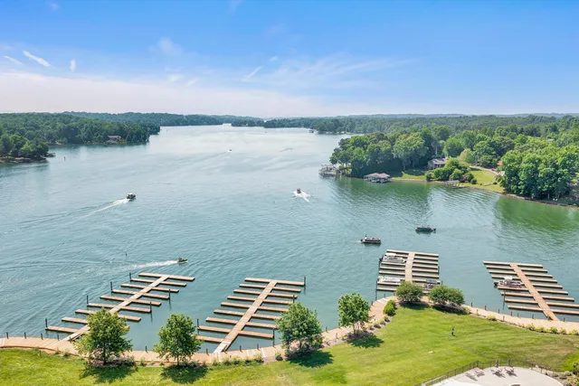 aerial view of a house with a lake view