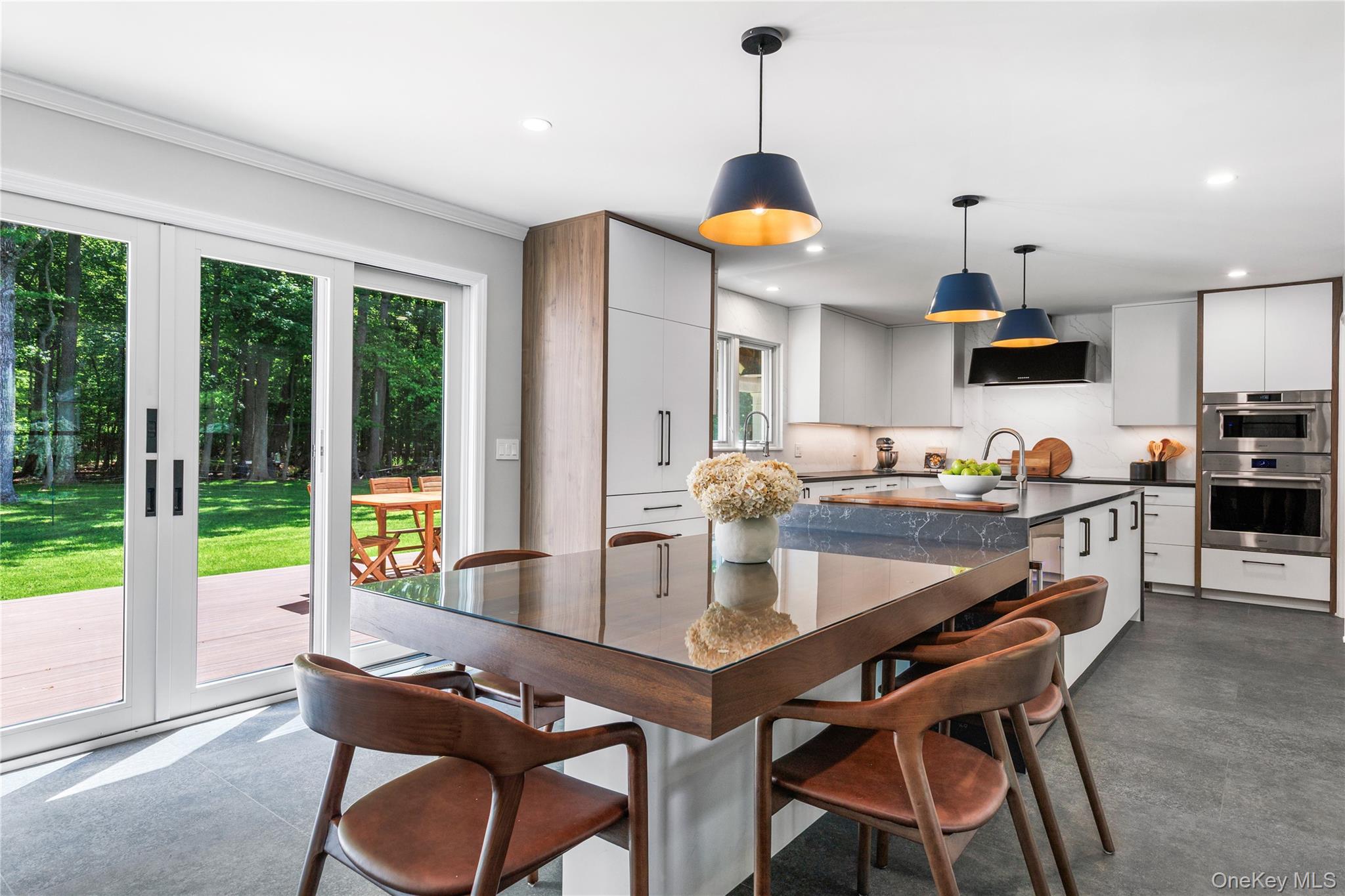 19 John Jay Place Rye, NY 10580 - Photo 12 of 45 The Architectural Digest worthy kitchen blends stylish design with every practical consideration, making it the showpiece of the home.