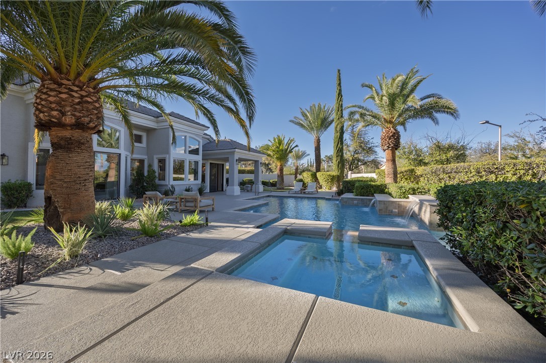 8800 Lusso Las Vegas, NV 89134 - Photo 9 of 85 Relaxing pool / spa with a patio