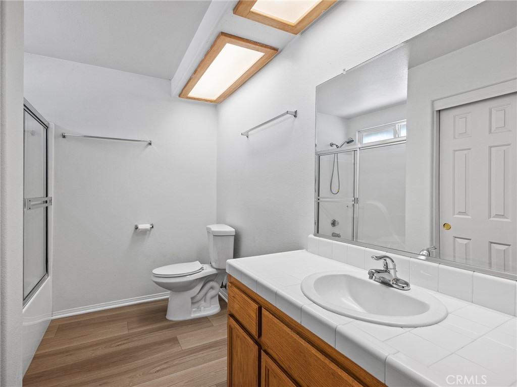 19068 Goleta Street Hesperia, CA 92345 - Photo 15 of 34 a bathroom with a sink and a mirror